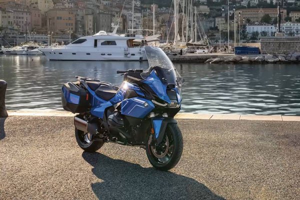 BMW touring motorcycle near a marina